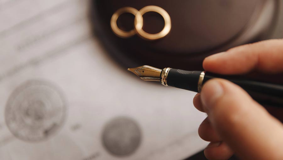 Legal divorce documents being organized for court submission, emphasizing accuracy and attention to detail.